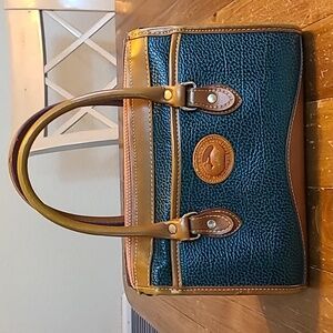 VINTAGE DOONEY AND BOURKE Green Pebbled Leather Bag With Tan Trim.